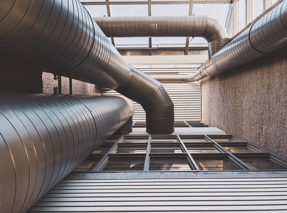 Commercial spiral ductwork installed by Done by Tone